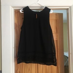 Simple black tank blouse with lace detail on hem